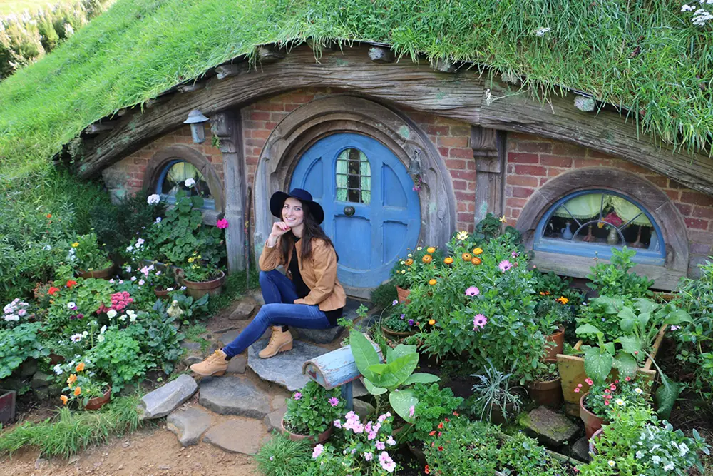 Svetlana in front Hobbits house in New Zealand